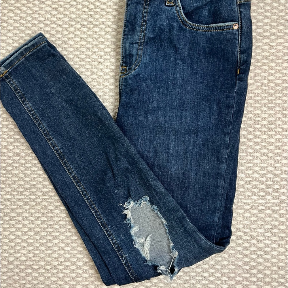 Free People busted knee skinny jeans